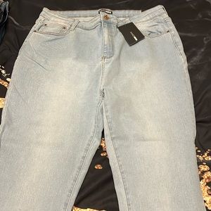Light blue skinny jeans, size 16 never worn